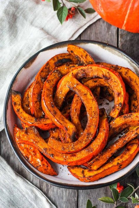 Tender and delicious Roasted Red Kuri Squash baked with an ancho chili powder -maple rub.  A perfect fall and winter side dish.  Easy to make with very little hands-on time. Vegan and Gluten-free. Kuri Squash Recipe, Red Kuri Squash, Side Dish Easy, Winter Side Dishes, Feasting At Home, Autumn Side Dishes, Ancho Chili Powder, Baked Squash, Ancho Chili