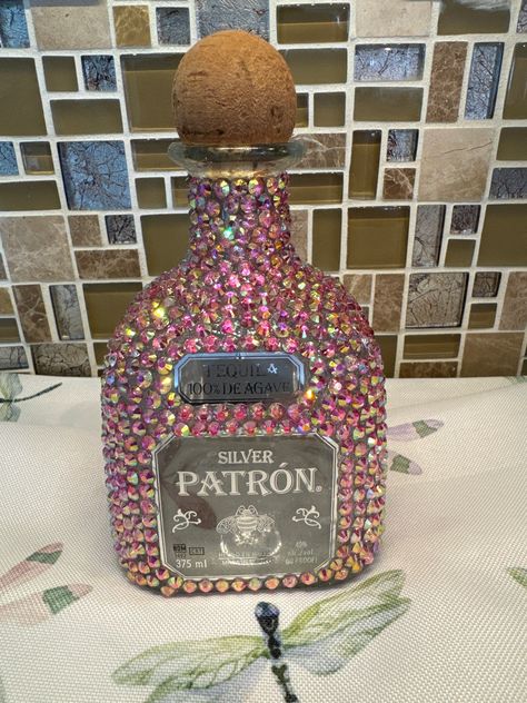 Silver Patron bottle "blinged" in rainbow fushia. Pink Bar Accessories, Bejeweled Bottles, Blinged Bottles, Bedazzled Stuff, Alcohol Bottle Decorations, Bedazzled Liquor Bottles, Bedazzled Bottle, Diy Bottles, Alcohol Bottle Crafts