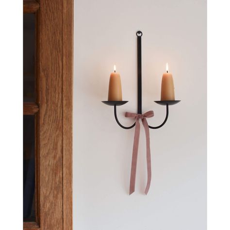 A black wall-mounted double candle sconce, made in Yorkshire, England. For adding a cosy glow to any space. Please note: Pre-order! This item is due back on 9th October 2024 and will be posted once it arrives with us. The delivery time has been adjusted accordingly. Thank you! A natural companion to our hand-dipped beeswax candles. Our timeless wall sconces will add warmth and charm to your home. Dimensions:  H 30 x W 24 x D 13 cm  (H 11.8" x W 9.4" x D 5.1") Suitable for candles of 20mm - 60mm Black Candle Holders, Wall Candle, Taper Candle Holder, Picture Hook, Wall Candle Holders, Ceramic Candle Holders, Candle Wall Sconces, Metal Candle Holders, Taper Candle Holders