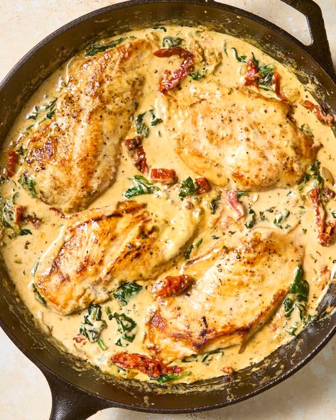 Tuscan Chicken Recipe (Just 8 Ingredients) | The Kitchn Creamy Tuscan Chicken Recipe, Tuscan Garlic Chicken, Creamy Parmesan Sauce, Tuscan Chicken, Simply Recipes, Boneless Chicken Breast, Full Meal Recipes, Ww Recipes, Tortellini