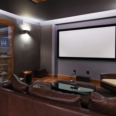 Private Home Theater in Jim Harbaugh's Ann Arbor Mansion Luxurious Home Theater, Brown Leather Sectional, Large Projector Screen, Home Dark, Wooden Cabinet, Private Home, Dark Walls, Theatre Design, Projector Screen