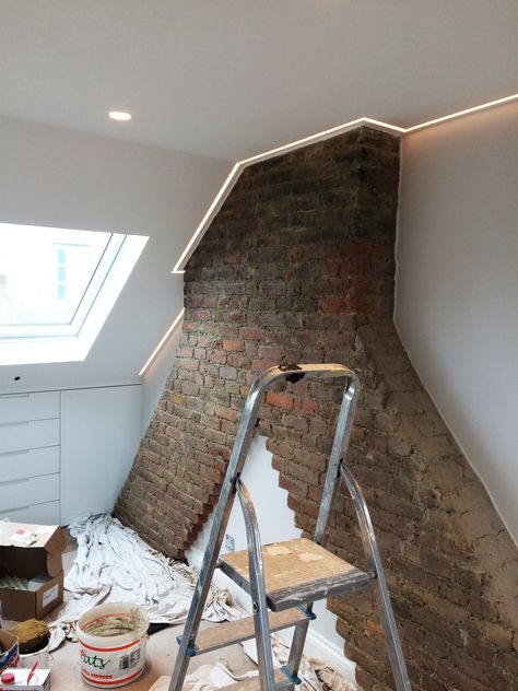 Check out this loft conversion in Wandsworth. The chimney breast has been left exposed with the original brickwork and a subtle light trimming added to the ceiling. Attic Diy, Loft Conversion Bedroom, Loft Door, Attic Office, Room Illustration, Attic Playroom, Attic Loft, Attic House, Apartment Storage