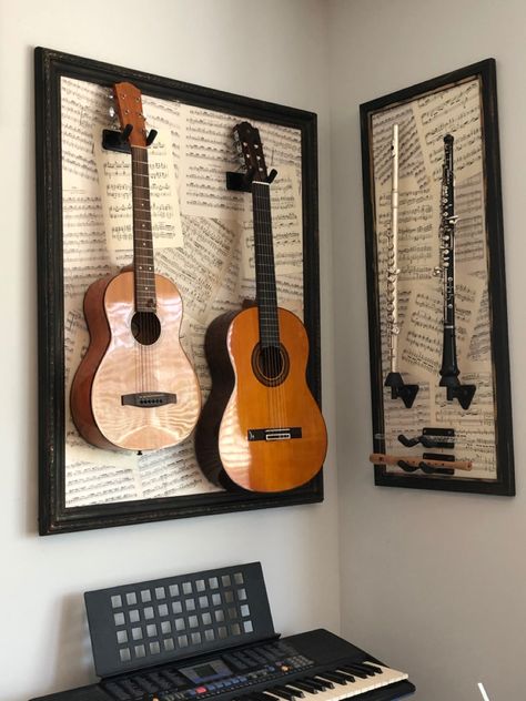 Musical Instrument Wall Display, Black And White Music Room Ideas, Instruments Hanging On Wall, Instrument Hanging Ideas, Music Themed Wall Decor, Music Instrument Display, Ukulele Display Ideas, Decorating With Instruments, Instruments Hung On Wall