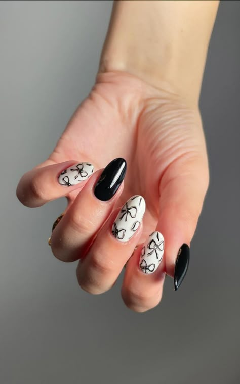 Get inspired by 30+ adorable bow nail designs, from cute 3D bow nails to short and sweet styles in pink, red, white, gold, and black. This also includes coquette nails, ribbon nails, short bow nails, french tip bow nails, bow nail art. (📷 kuypernailart IG) Flower And Bow Nails, Black Bow Nails, Girly Coquette Aesthetic, Vienna Sausages, Bows Nails, Ribbon Nails, Short Bow, Nails Bow, Bow Nail Designs