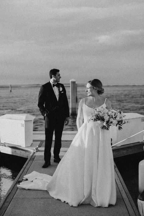 wedding photos, bride and groom portraits, waterfront wedding pics, sunset wedding photos, marina wedding, sailboat wedding, florida wedding, dock wedding,  Oyster Bay Yacht Club, Fernandina Beach, Amelia Island, Jax, Jacksonville, Florida, Fl, Wedding Venue, Wedding Wire, Weddings, Wedding Coordinator, Wedding Ideas, Wedding Inspo, Wedding Inspiration, wedding flowers, white wedding flowers, we are the bowsers, photographer, photography, greenery, bridal bouquet Wedding Photos On A Dock, Wedding Dock Photos, Dock Wedding Photos, Wedding Oysters, Wedding Sailboat, Sailing Wedding, Greenery Bridal Bouquet, Dock Wedding, Sailboat Wedding