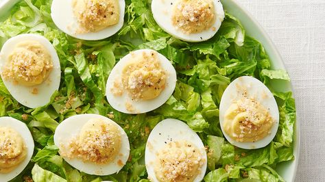 All hail Caesar deviled eggs! Make these clever appetizers that riff on everyone’s favorite salad, and serve them up on a bed of — what else — romaine. Deviled Egg Recipes, Best Potluck Dishes, Devilled Eggs, Easter Appetizers, Salad Pasta, Deviled Eggs Recipe, Potluck Dishes, Deviled Egg, Eggs Recipe