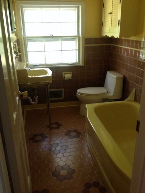 My current bathroom. So far I've repainted the walls primer white, and replaced the vanity mirror and sink for better storage. Mid century bathroom. Yellow and taupe. Second Floor Hallway, Vintage Yellow Bathroom, 90s Bathroom, 1970s Bathroom, 80s Bathroom, Bathroom Yellow, Mid Century Apartment, 80s House, Entrance Living Room