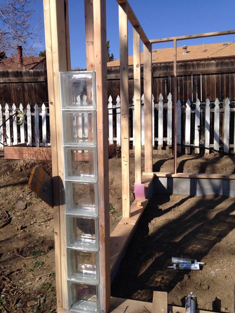 Glass blocks in front of the greenhouse Glass Block Greenhouse, Glass Block Garden Ideas, Glass Block Ideas Home, Glass Blocks Wall Outdoor, Glass Block Exterior Wall, Glass Block Architecture, Recycled Window Glasshouse, Cinder Block Furniture, Window Greenhouse