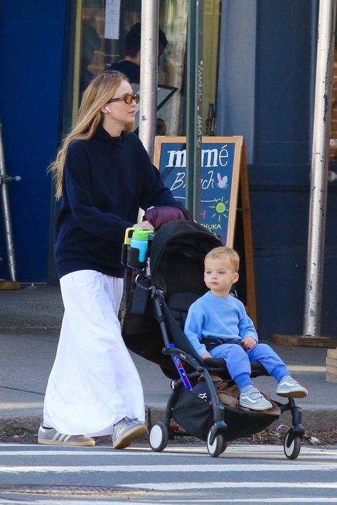 Jennifer Lawrence wears a navy sweater and white skirt while out for a playdate with her son on Easter Sunday in New York City-310324_10 Babyzen Yoyo Stroller, Jennifer Lawrence Street Style, Sunday In New York, Jennifer Lawrence Hair, Yoyo Stroller, Jennifer Lawrence Style, White Sweater Outfit, Jennifer Lawrence Pics, Stylish Mom