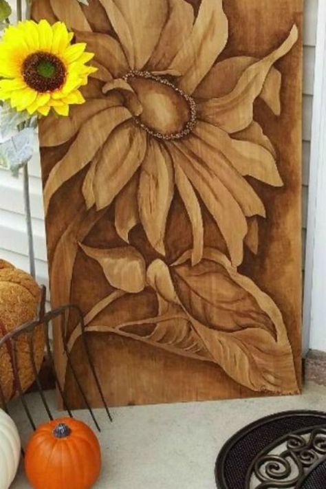 Just like drawing on paper with charcoal, painting with stain has its own quaint charm. Create a monochrome masterpiece on a free plank of wood that'll look gorgeous on display. Get the tutorial here. Fall Patio Decor, Stain Art, Fall Patio, Rustic Patio, Easy Diy Hacks, Gel Stain, Wood Stain, Into The Woods, Sunflower Design