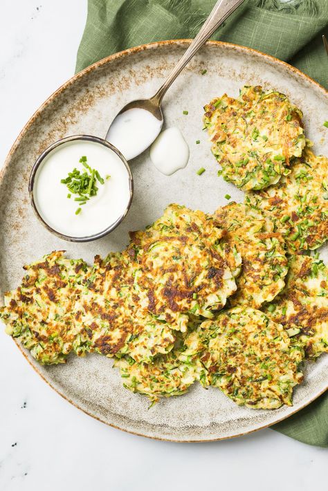 Like potato pancakes but with fewer carbs, these savory Zucchini Pancakes are the perfect side dish with grilled chicken or meat. #zucchini #vegetarian #summer #sidedish #healthyrecipes Zucchini Pancake, Veggie Kabobs, Affordable Recipes, Cauliflower Fritters, Zucchini Pancakes, Grilled Corn Salad, Healthy Budget, Watermelon Feta Salad, Watermelon And Feta