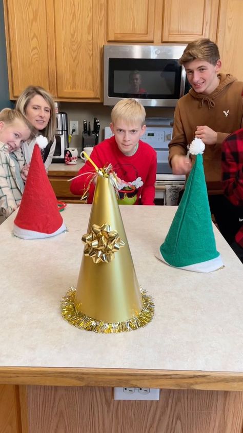 Santa Hat Ring Toss Game 🎄 | Santa Hat Ring Toss Game 🎄 Kids, Mom, and family play festive Christmas game with Santa Hats for holiday prizes. Great game for family gatherings. (for... | By Little Bros | Facebook Christmas Ring Toss, Hot Potato Game, Ring Toss Game, Christmas Ring, Christmas Game, Ring Toss, Holiday Games, Toss Game, Santa Hats