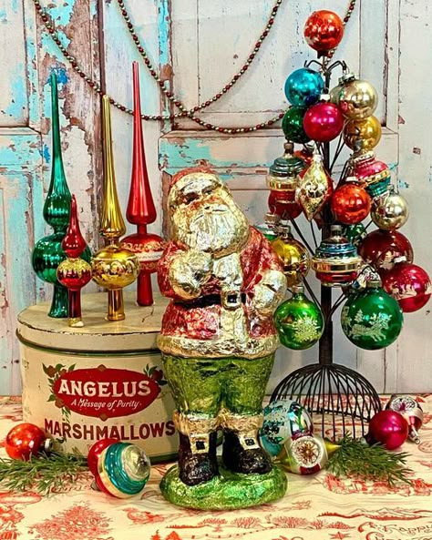 Sherry Ricamore on Instagram: "Happy Christmas eve! Wanted to share my Shiny Bright Christmas tree, vintage tree toppers and my foil Santa. I got the vintage metal ornament-holder tree stand last year, but it arrived after the holidays so this is the first time I’ve used it! It is the perfect way to show off your ornaments. Have a fun day y’all! I’m going to candlelight service and then family Christmas party!! #retroshowandtell #mypastperfectfind #happycolorfulhome #visionsofvintage_ #virtua How To Display Vintage Ornaments, Vintage Ceramic Christmas Tree Display, Shiny Brite Christmas Tree, Ornament Holder, Candlelight Service, Bright Christmas Tree, Vintage Ceramic Christmas Tree, Christmas Tree Vintage, Vintage Tree Toppers