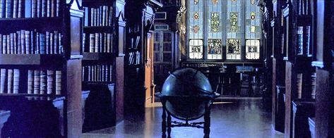 Restricted Section | Harry Potter Wiki | Fandom Hufflepuff Common Room, Harry Potter Library, Mirror Of Erised, Hogwarts Library, Harry Potter Wiki, High Building, Early Middle Ages, Hogwarts Castle, Goblet Of Fire