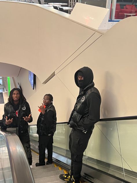 Photo shoot in escalator wearing all black, black shiny puffer vest with black cargoes. Escalator Photoshoot Men, Mall Photoshoot Men, Escalator Photoshoot, Black Cargos, Black Cargo, Black Puffer, Photoshoot Ideas, Clothing Brand, Puffer