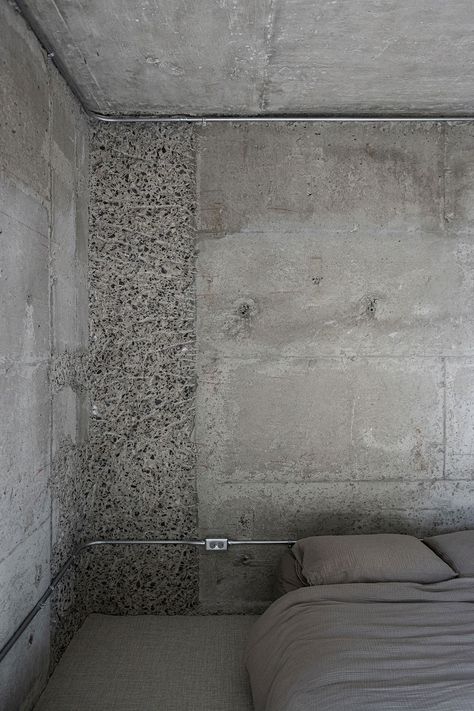 Concrete Dreams: Jean Verville’s Ethereal Transformation of a Québec City Apartment | Yatzer Brutalist Bedroom, Brutalist Apartment, Residential Tower, Brutalist Buildings, Apartment Studio, Stainless Steel Counters, Live Tree, School Of Architecture, Thermal Comfort