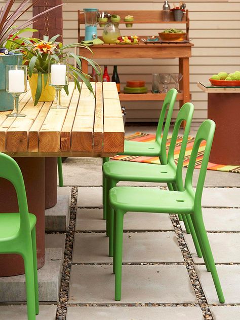 This patio was transformed into a fun and functional outdoor getaway. More of this backyard patio transformation: http://www.bhg.com/home-improvement/patio/designs/backyard-patio-transformation/?socsrc=bhgpin052113functionalpatio=11 Pebble Patio, Outdoor Buffet, Green Chairs, Cheap Patio Furniture, Outdoor Dinner Parties, Patio Inspiration, Outdoor Dinner, Patio Spaces, Green Chair