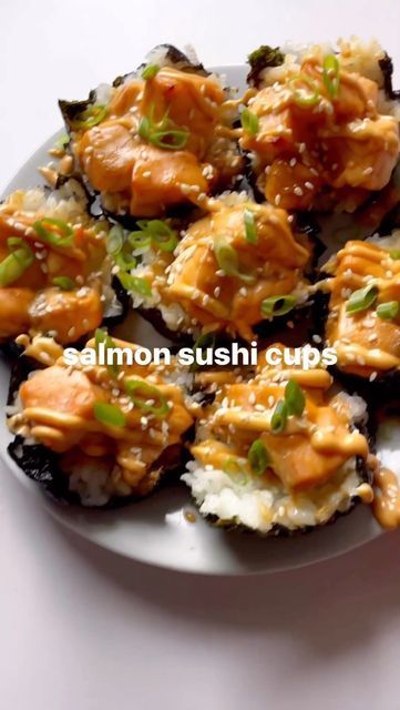 🍥 YOUR DAILY DOSE OF SUSHI! 🍣 on Instagram: "Spicy SALMON cups!! 😍🔥🍣 Let’s make them! 👀😋 Recipe and 🎥 by @anythingbutramen! . Ingredients: - 2-3 salmon filets or about 1.25 cups - 2 sheets of nori - 1.5 cups sushi rice - 1 TBS soy sauce - salt - scallions and sesame seeds for topping Spicy Mayo - 3 TBS mayo - 1-2 tsp sriracha - 1 tsp sesame oil Directions: - cook sushi rice according to package - preheat oven to 400°F - dice salmon into small cubes and add to a large bowl - mix the ingredients for the spicy mayo and add 2 TBS to the salmon along with salt and soy sauce and mix - cut nori into squares and add rice to each, focusing on the center - add each piece of nori with rice to a muffin tin, add a scoop of salmon mixture and bake for 15 minutes - top with leftover spicy mayo, s Salmon Cups, Cook Sushi Rice, Salmon Filets, Shrimp Rolls, Salmon Sushi, Spicy Salmon, Spicy Mayo, Salmon Filet, Sushi Rice