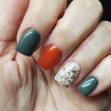 Gel nails, burnt orange, army green Dark Teal And Rust Orange Nails, Green Orange Nails, Green And Orange Nails, Orange And Green Nails, Irish Nail Designs, Irish Nails, Fall Wedding Nails, Orange Nail Designs, Cream Nails