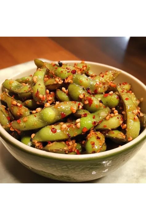 Are you ready to spice up your snack game? This Garlic-Infused Spicy Edamame recipe is the perfect combo of heat and flavor. With just a handful of ingredients, you can whip up this amazing appetizer in no time. Packed with protein and unforgettable garlic goodness, it's great for movie nights, parties, or enjoying as a healthy afternoon snack. Plus, it’s super simple to make! In just a few steps, you'll have delicious, mouthwatering edamame that's bound to impress your friends and family. Dive into deliciousness today! Spicy Garlic Edamame Recipes, Edamame Seasoning, Spicy Edamame Recipes, Garlic Edamame Recipe, Spicy Garlic Edamame, Edamame Recipes Spicy, Crispy Edamame, Edamame Snack, Spicy Edamame