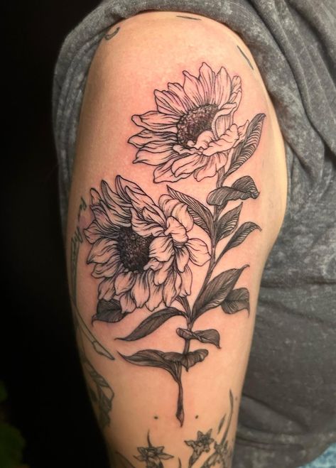 @colleenajsmith completed this delicate fine line sunflower tattoo. Her floral pieces always have some intuitive linework which makes them expressive, and as a result, most unique. Sunflowers Facing Each Other Tattoo, Sunflower Patch Tattoo, Knee Sunflower Tattoo, Men’s Sunflower Tattoo Ideas, Sunflower Tattoo Linework, Sunflower Knee Tattoo, American Traditional Sunflower Tattoo, Sunflower Tattoo Men, Van Gogh Sunflower Tattoo