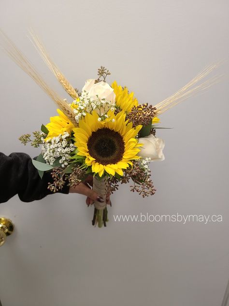 Yellow sunflowers, white roses, seeded eucalyptus, wheat in a posy bridal bouquet with a burlap wrap. Wearable Flowers, Pew Markers, Sunflower Bridal Bouquet, Sunflowers Roses, Flowers Centerpieces, Bridal Trends, Bridal Sunflowers, Mother Wedding, Mother Wedding Dress