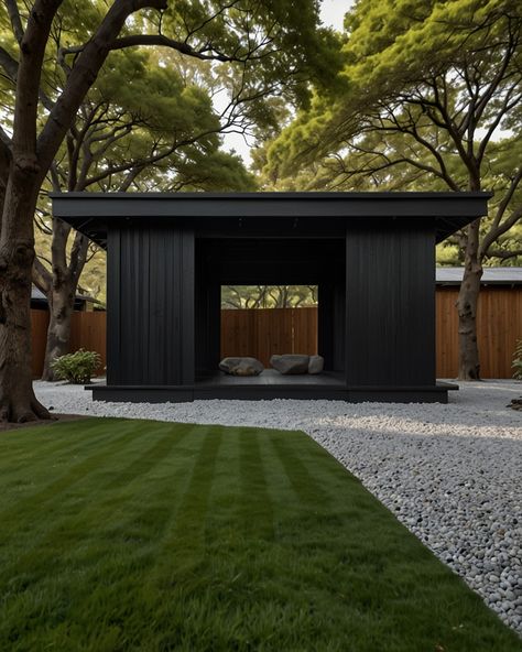 ◼️ Black Wooden Pavilion: A minimalist pavilion constructed from dark-stained wood, nestled amongst a serene Japanese garden with raked gravel and meticulously placed rocks. #japaneseaesthetic #minimalistlife #matteblackeverything #minimalismlifestyle #japaneseaesthetic #findpeace #natureinspired #architecturephotography #designinspiration #blackandwhitephotography #instagood #instadaily #photooftheday #travelgram #explorepage #picoftheday #beautiful #luxurylifestyle #interiordesign #modernd... Garden Pavilion Architecture, Wooden Pavilion, Japanese Tea House, Pavilion Architecture, Pavilion Design, Outdoor Shelters, Garden Pavilion, Dark Wood Stain, Minimalist Landscape