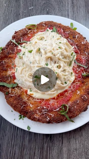 Angela Miley on Instagram: "Chicken Parm Pizza Style 🍕🍝 This is one of my favorite dishes from the @cheesecakefactory so I had to make it at home! It was so delicious 🤤 let me know if you want the full recipe! #thesecarbsdontcount" Chicken Parm Pizza, Pizza Style, Chicken Parm, Chicken Parmesan, So Delicious, Let Me Know, Make It, My Favorite, Pizza