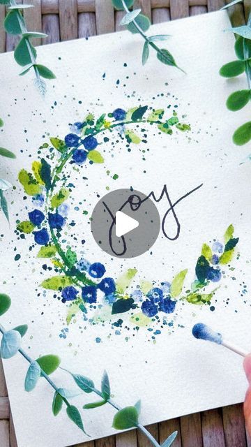 Mary Wu | Aspiring Watercolor & Flower Preservationist on Instagram: "Stamp a “C” and turn it into a wreath!  Use a jar or anything that’s round to make the “C” shape. 😊 this is my second “wreath” entry to October’s #pandatober

💙full length slow video for subscribers💙

Add dimension to your berries by pressing your q-tip in different shades of blue… let’s make a blueberry wreath for the holidays?? 

Add an inspiring word with a pen if you like or leave it blank... Either way you got an easy card in minutes! 

Materials (all can be found in my Amazon storefront link in bio):
👩🏻‍🎨size 2 sable mop brush for splattering @goldenmapleart 
👩🏻‍🎨 size 6 round brush @princetonbrush 
👩🏻‍🎨round mason jar and q-tips
👩🏻‍🎨watercolor Nicpro 168 color set @nicprodirect 
👩🏻‍🎨calligraphy p Blueberry Wreath, Slow Video, Diy Watercolor Cards, Different Shades Of Blue, Holiday Hack, Calligraphy Pen, Handmade Christmas Crafts, Diy Watercolor Painting, Watercolor Christmas Cards