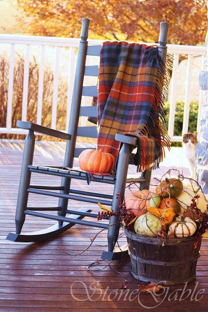 There's no better spot to relax on a chilly day than a rocking chair (and under a plaid blanket, no less!) with hot apple cider in hand. Porche Halloween, Stone Gable, Fall Blessings, Autumn Greetings, Porch Sitting, Deco Champetre, Chilly Morning, Fleece Plaid, Golden Autumn