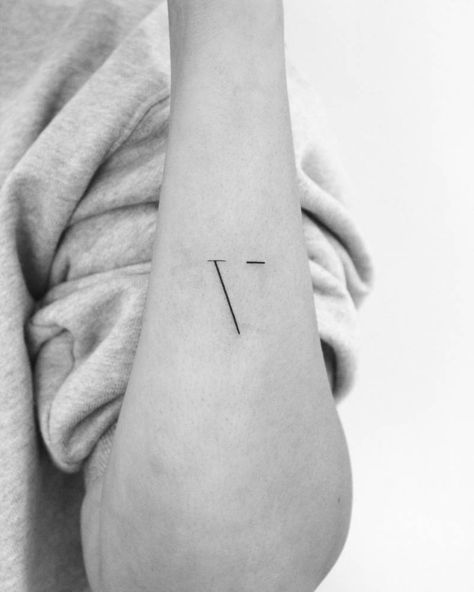 Minimalistic letter "V" tattoo for her son. V Letter Tattoo Designs For Women, Initial V Tattoo, Small V Tattoo, V Tatoos Letter, V In Different Fonts, Minimalist Initial Tattoo, Letter F Tattoo Ideas, V Initial Tattoo, X Tattoo Letter