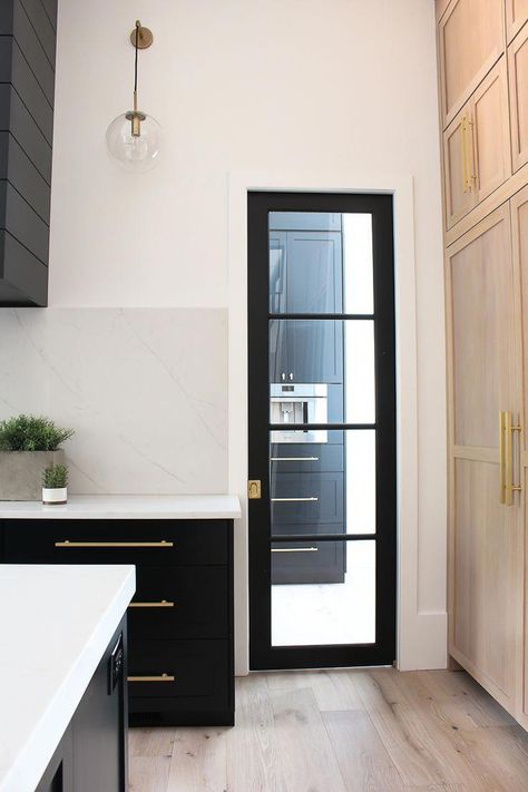 black glass pantry pocket door with steel transoms in modern kitchen #homeInterior Pantry Pocket Door, Glass Pantry, Steel Door Design, Modern Kitchen Design Black, Pocket Door, Pantry Door, Kitchen Doors, Full Bathroom, Modern Farmhouse Kitchens