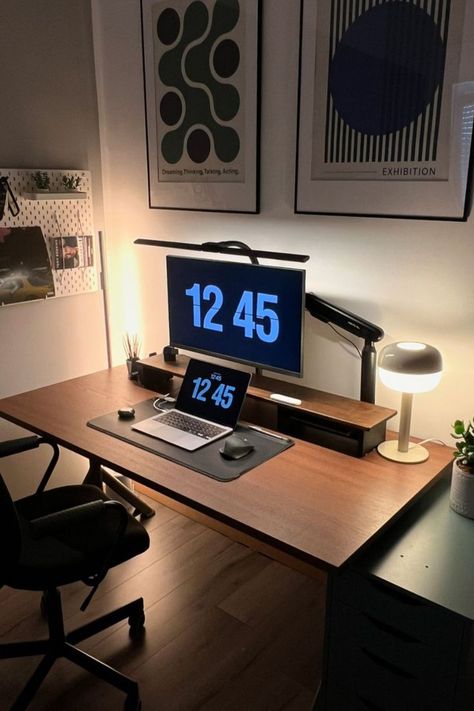 A minimal and elegant desk setup featuring a walnut desk, warm lighting, minimalistic wall art, and a small plant, creating a cozy and stylish workspace. Walnut Desk Setup, Aesthetic Hombre, Minimal Workspace, Minimalistic Wall Art, Bedroom Redesign, Walnut Desk, Computer Desk Setup, Personalized Desk, Aesthetic Space