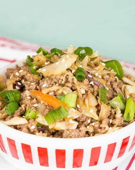 Crack Slaw in a white bowl using ground beef and coleslaw mix, topped with green onions and sesame seeds Cole Slaw Mix, Keto Cole Slaw, Keto Connect, Slaw Recipe, Cole Slaw, Slaw Recipes, Ground Beef Recipes Easy, Coleslaw Recipe, Egg Roll