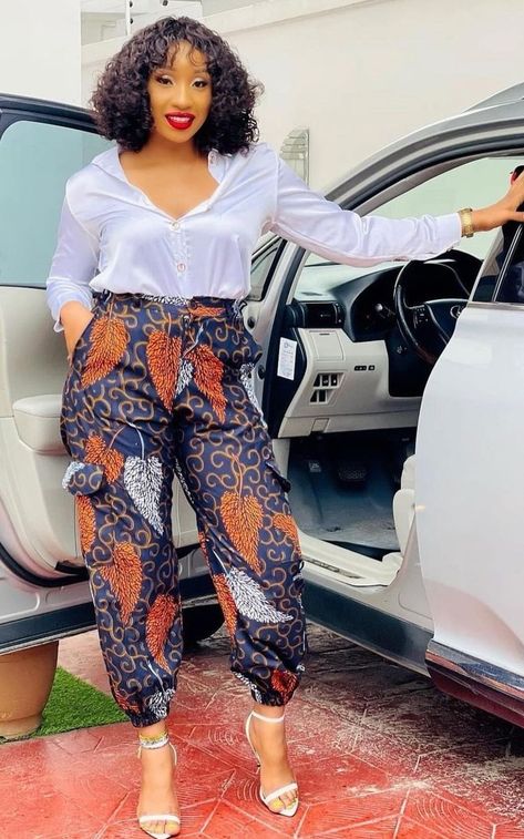 Kitenge Trousers Designs, Chitenge Trousers For Women, Kitenge Trousers For Women, Ankara Baggy Trousers And Top, Ankara Cargo Pants Women, African Print Pants High Waist Trousers, Bold Fashion Outfits, Two Piece Outfits Pants, Ankara Trousers