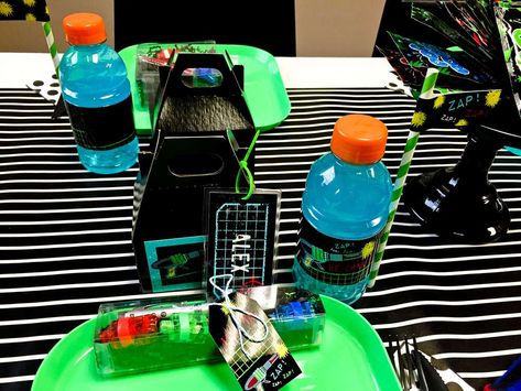 An Awesome Laser Tag Party | CatchMyParty.com Laser Tag Birthday Party Ideas, Party Food Containers, Laser Tag Party Favors, Paintball Party, Laser Tag Birthday Party, Birthday Party Invitations Free, Laser Tag Party, Laser Tag Birthday, Diy Drinks