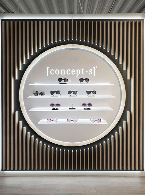 wall display with led by designconcept-s-design Retail Wall Displays, Eyewear Shop Design, Cladding Texture, Mobile Shop Design, Eyewear Store Design, Store Shelves Design, Retail Store Interior Design, Salon Suites Decor, Optical Shop