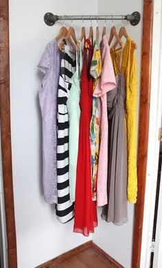 Hanging Dresses In Closet Small Spaces, Hanging Dresses In Closet, Clothing Storage Ideas, Hanging Dresses, Dress Storage, Corner Closet, Small Closet Space, Closet Rack, No Closet Solutions