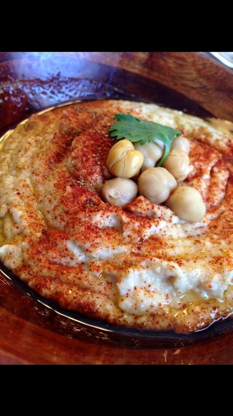 Try making your own Sabra-style hummus at home; it's even tastier than what you find in stores! Sabra Hummus Recipe, Eden Eats, Chickpea Water, Sabra Hummus, Garlic Hummus, Dry Chickpeas, Cooked Food, Homemade Hummus, Vegan Sauces