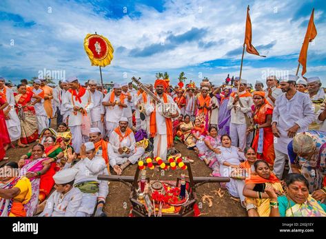 Download this stock image: Devotees participate in the vibrant Wari Palki Yatra at Pandharpur, a pilgrimage celebrating devotion and unity, filled with music, dance. - 2XGJ1EY from Alamy's library of millions of high resolution stock photos, illustrations and vectors. Pandharpur Wari, Music Dance, Pilgrimage, High Resolution, Stock Images, Resolution, Stock Photos, Illustrations, Celebrities