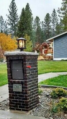 Dark brick mailbox DIY project, lighted, red flag, locked mailbox designed and built by Mac Anderson Modern Mailbox Brick, Brick Mailbox Diy, Brick Mailbox With Light, Red Brick Mailbox Ideas, Built In Mailbox Ideas, French Drain Ideas, Brick Mailbox Ideas, Mailbox Inspiration, Small Front Yard Ideas