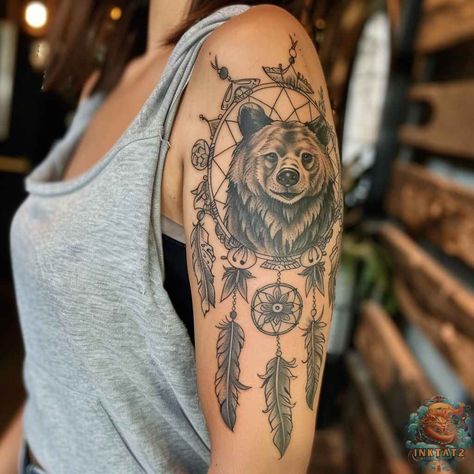 A powerful bear shoulder tattoo encased in a dreamcatcher with delicate feather accents. This design combines strength and elegance, making it ideal for a bold yet feminine look. Check out inktat2.com for similar bear tattoo designs and save this pin for your next ink session! 🪶🐾 Bear Shoulder Tattoo, Geometric Bear Tattoo, Traditional Bear Tattoo, Bear Claw Tattoo, Grizzly Bear Tattoos, Bear Tattoo Ideas, Polar Bear Tattoo, Claw Tattoo, Bear Tattoo Designs