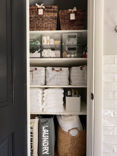 Categorize the Bathroom Closet: Maximize closet space by categorizing, labeling and organizing everything you own. Use large baskets for extra linens, clear bins for toiletries and color-coordinated hampers to make laundry day a breeze. See more at Bless'er House. Bathroom Closet Organization Ideas, Tiny Closet Organization, Hanging Bathroom Shelves, Small Linen Closets, Bathroom Linen Closet, Bathroom Sink Organization, Beautiful Bathroom Decor, Bathroom Drawer Organization, Bathroom Closet Organization