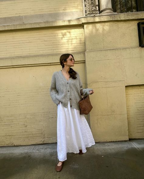 an outfit combo that’ll be on repeat all spring long so i guess you could call this my cardiganandagainandagain 🔁 | Instagram White Dress Cardigan Outfit, White Dress And Cardigan Outfit, Long Dress And Cardigan Outfit, White Skirt Fall Outfit, White Skirt Outfit Winter, Long Dress With Cardigan, White Long Skirt Outfit, Dress And Cardigan Outfit, Cardigan Outfit Ideas