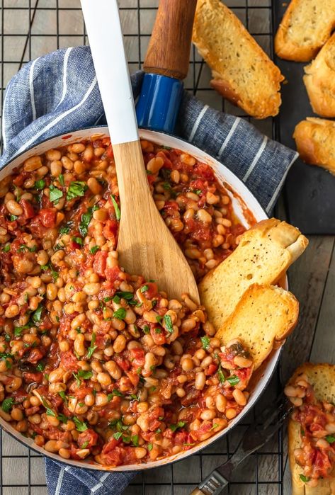 This White Beans recipe is so simple, yet so delicious! Cannellini beans cooked with tomatoes, garlic, and chicken broth make for one tasty side dish. It's perfect for holidays or easy weeknight meals! Cannelli Beans Recipes, Caneloni Beans Recipe, Canned Beans Recipe Ideas, Bean Soups, Cannellini Beans Recipes, Magical Fruit, White Bean Recipes, Fall Eats, Veg Recipe