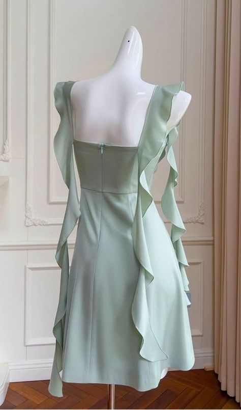 Elevate your allure with our Sage Green Satin Mini Dress. Crafted to captivate, its satin fabric drapes luxuriously, while the subtle hue exudes sophistication. Perfect for any occasion, it radiates timeless elegance with a modern twist. Green Satin Mini Dress, Blue Homecoming Dress, Prom Dress Blue, Hot Prom Dress, Satin Corset Dress, Blue Homecoming Dresses, Marine Uniform, Short Prom Dress, Short Prom