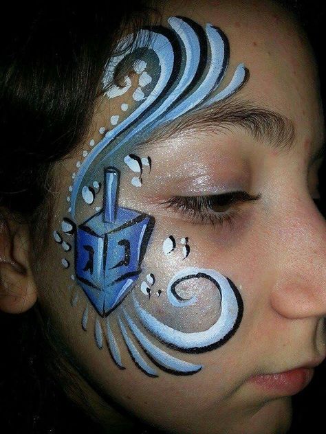 Hanukkah dreidel Hanukkah Face Paint, Hanukkah Makeup, Purim Ideas, Hanukkah Dreidel, Christmas Face Painting, Jewish Crafts, Face Painting Easy, Kids Face Paint, Face Paintings