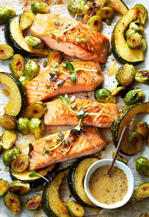 The trick to moist, flavourful baked salmon is to keep the skin on! Serve it with roasted acorn squash and brussels sprouts for an easy weeknight meal. Sauteed Greens, Acorn Squash Recipes, Easy Salmon Recipes, Recipes Yummy, How To Cook Fish, Acorn Squash, Cooking Salmon, Squash Recipes, Easy Weeknight Dinners