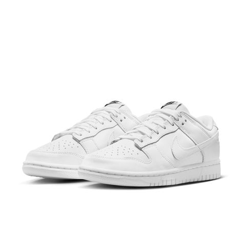 Introducing the Nike Wmns Dunk Low 'Triple White' – a sleek and stylish offering that's sure to please. These shoes feature leather uppers, side panels made of supple leathers, and a breathable mesh tongue for maximum comfort. Black Nike branding adds an extra touch of flair, while the midsole and treading are finished in crisp white hues. Perfect for street style or the gym, these shoes are sure to become your new favorite go-to. Step into timeless style with the Nike Wmns Dunk Low 'Triple White'. Nike Dunk Low Triple White, Dunks White, Wmns Dunk Low, Nike Models, Womens Air Jordans, Baskets Nike, Limited Edition Sneakers, Nike Brand, Jordan 11