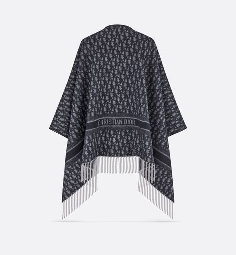 The Dior Oblique poncho showcases the House's iconic motif with a slightly shorter version of the timeless silhouette. Crafted in a blend of navy blue wool and cashmere, it features fringed edges and tonal Christian Dior signature jacquard bands. The soft and warm poncho may be worn over the shoulders and will add the finishing touch to any modern attire.. Dior Star, Blanket Poncho, Icon Shoes, Dior Oblique, Dior Book Tote, Tuxedo Jacket, Blue Wool, Pant Shirt, Tie And Pocket Square